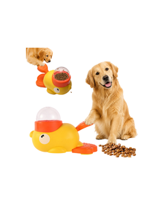 Duck treat dispenser dog toy with golden retriever pressing paw pedal